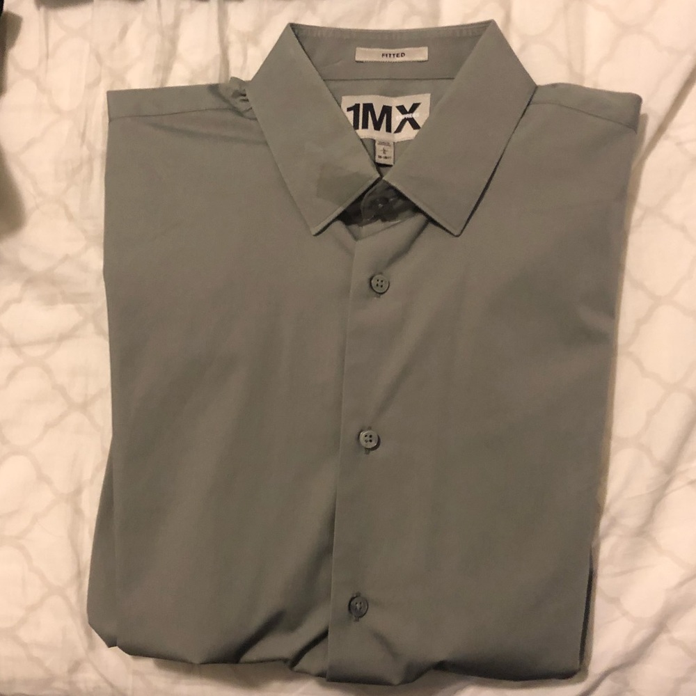 Men’s fitted button down long sleeve shirt.